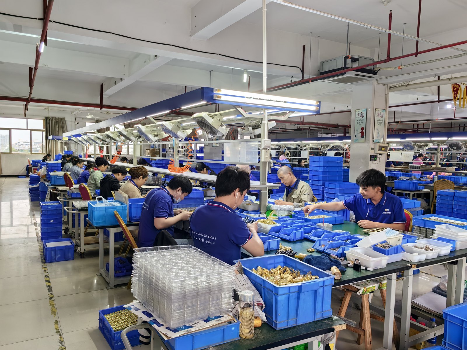 Changhao workers assembling padlocks at the factory production line